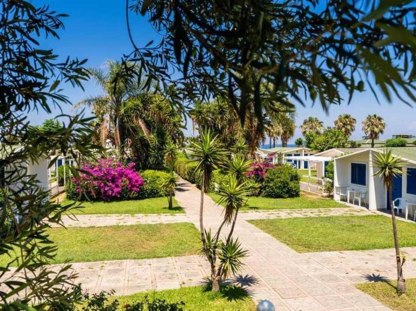 Fruit Village Mortelle Le Dune Beach Resort Bagian luar foto